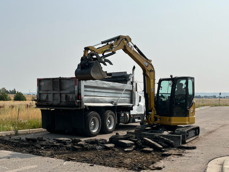 Full depth pot hole repair